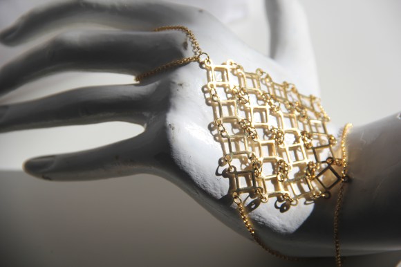 Love this boho style back-of-my-hand bracelet. I linked each individual square to make this pattern. Time consuming but worth it!